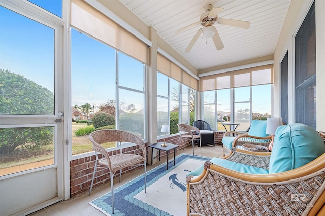 sunroom / solarium with ceiling fan