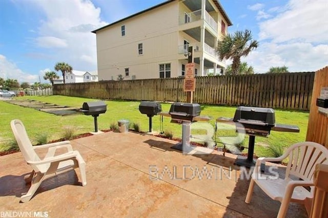 view of patio featuring a grill