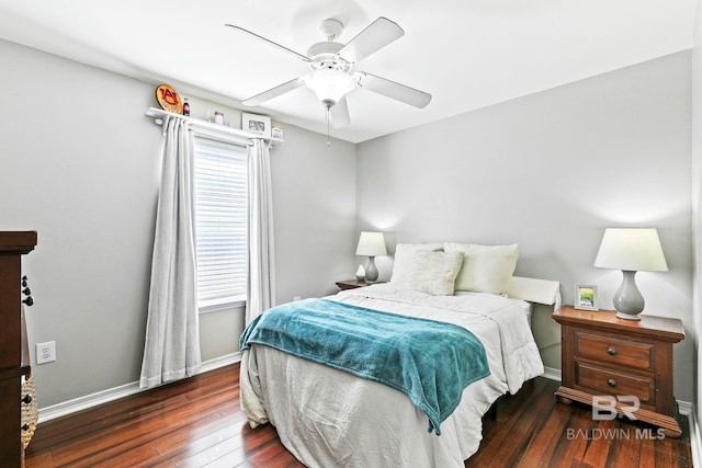 bedroom featuring ceiling fan and dark wood-type flooring