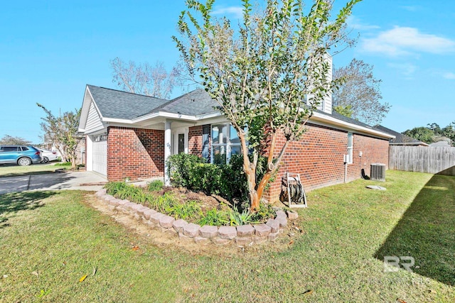 view of property exterior with a yard, a garage, and central air condition unit