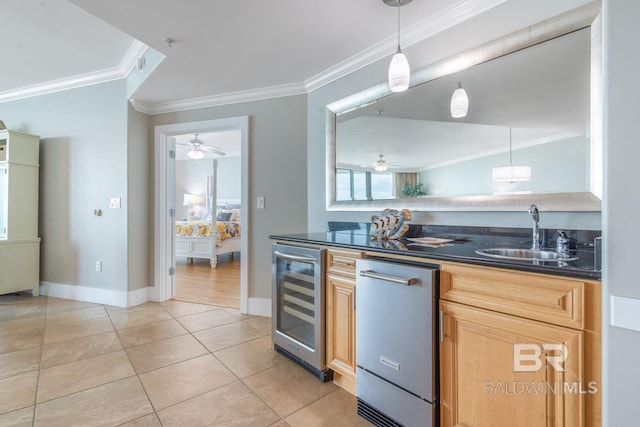 kitchen with stainless steel dishwasher, ceiling fan, wine cooler, and sink