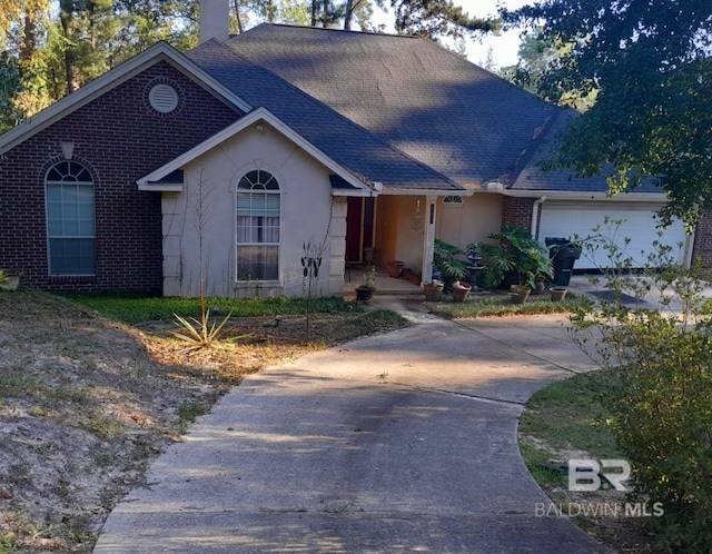 ranch-style home with a garage