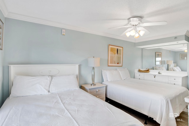 bedroom featuring wood-type flooring, ceiling fan, and ornamental molding