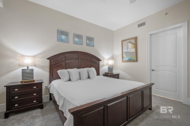 bedroom with light colored carpet and visible vents