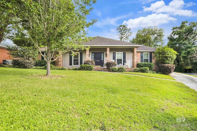 7431 Summer Ct, Mobile, AL 36695 - ranch-style house featuring a front lawn, covered porch, and brick siding