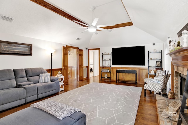 7431 Summer Ct, Mobile, AL 36695 - living area featuring a brick fireplace, a ceiling fan, vaulted ceiling, and wood finished floors