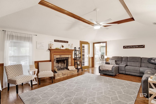 7431 Summer Ct, Mobile, AL 36695 - living room featuring vaulted ceiling, a ceiling fan, wood finished floors, and a fireplace