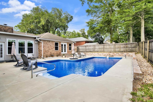 7431 Summer Ct, Mobile, AL 36695 - view of swimming pool with a patio area and a fenced backyard