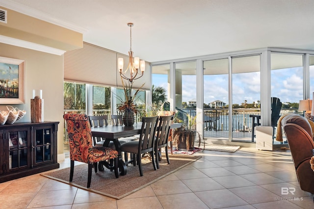 dining space with a wall of windows, visible vents, an inviting chandelier, crown molding, and tile patterned floors