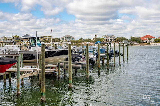 view of dock with boat lift and a water view