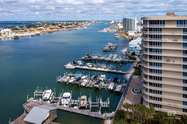 birds eye view of property with a water view