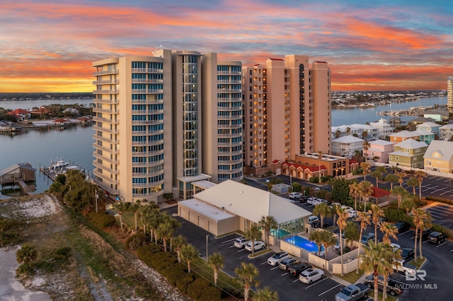 birds eye view of property featuring a water view