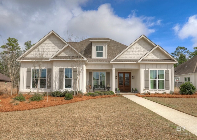 craftsman-style home featuring french doors