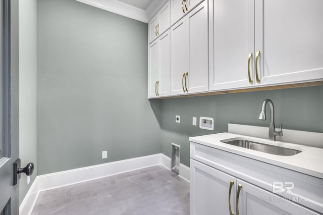 845 Inlet Cir, Gulf Shores, AL 36542 - washroom with electric dryer hookup, hookup for a washing machine, cabinet space, and crown molding