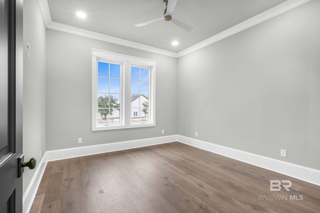 845 Inlet Cir, Gulf Shores, AL 36542 - empty room with dark wood-type flooring, crown molding, a ceiling fan, and recessed lighting