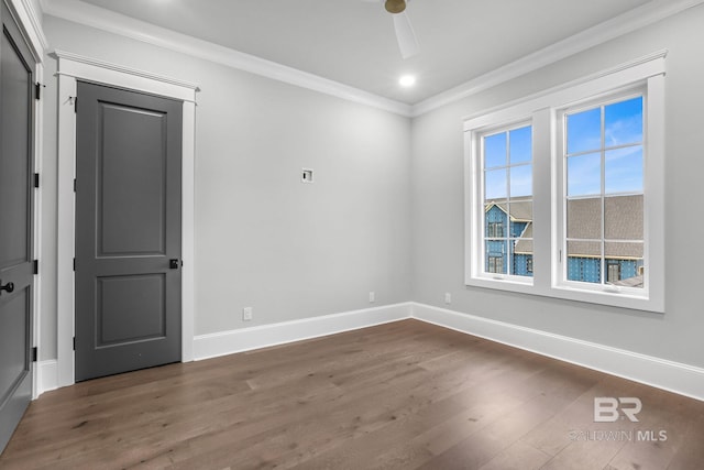 845 Inlet Cir, Gulf Shores, AL 36542 - spare room with ornamental molding, dark wood-style floors, and recessed lighting