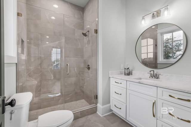 845 Inlet Cir, Gulf Shores, AL 36542 - bathroom featuring vanity, a shower stall, and tile patterned flooring