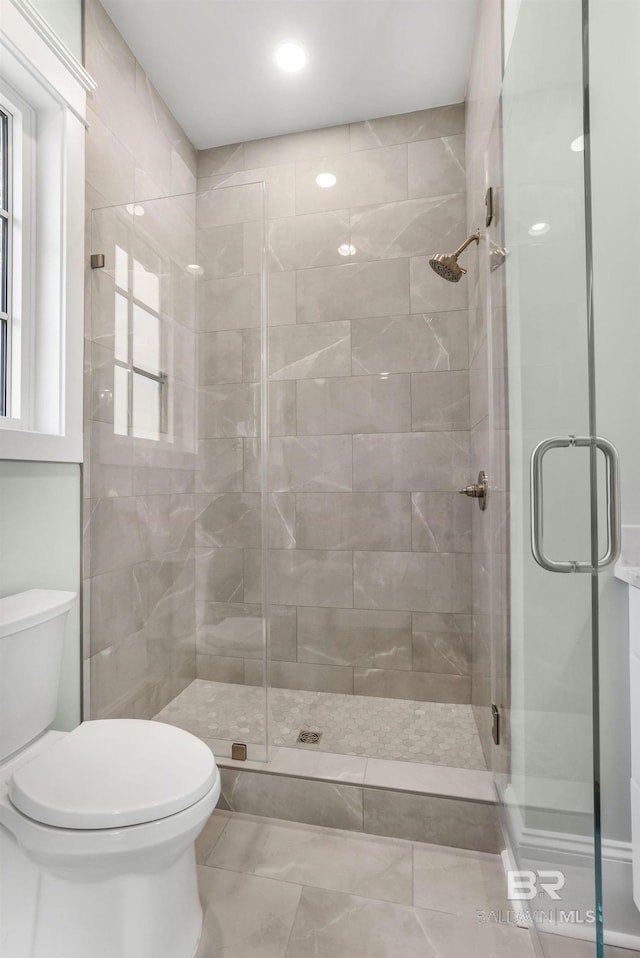 845 Inlet Cir, Gulf Shores, AL 36542 - bathroom with toilet and a stall shower
