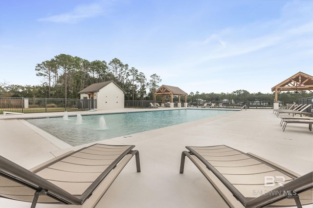 845 Inlet Cir, Gulf Shores, AL 36542 - community pool with a gazebo and a patio area