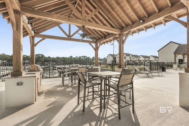 845 Inlet Cir, Gulf Shores, AL 36542 - view of patio with a gazebo, an outdoor kitchen, a ceiling fan, and outdoor dining space