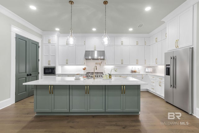 845 Inlet Cir, Gulf Shores, AL 36542 - kitchen featuring high end fridge, built in microwave, under cabinet range hood, light countertops, and white cabinets