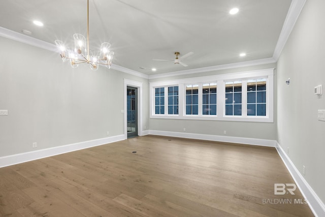 845 Inlet Cir, Gulf Shores, AL 36542 - spare room with crown molding, recessed lighting, a ceiling fan, wood finished floors, and a chandelier