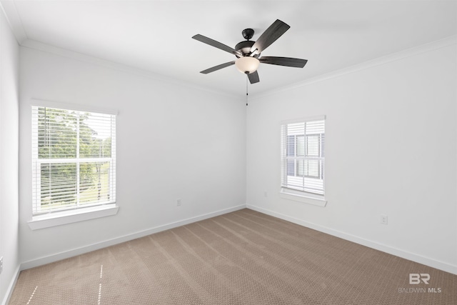 4669 Casablanca Dr, Orange Beach, AL 36561 - empty room featuring ornamental molding, carpet, baseboards, and ceiling fan