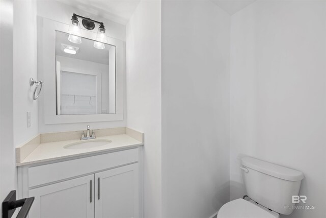4669 Casablanca Dr, Orange Beach, AL 36561 - bathroom featuring toilet and vanity