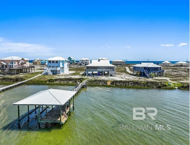 view of dock with a water view