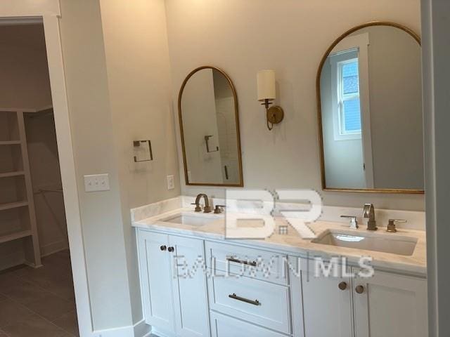 bathroom featuring vanity and tile patterned floors