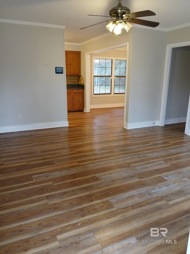 unfurnished living room featuring crown molding, hardwood / wood-style floors, and ceiling fan