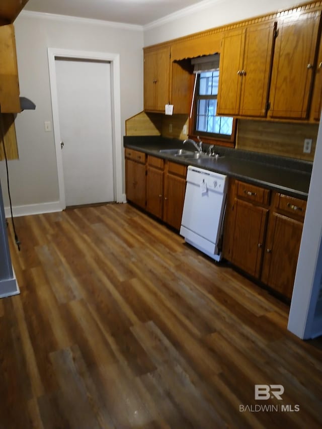 kitchen featuring dark hardwood / wood-style flooring, sink, ornamental molding, and dishwasher