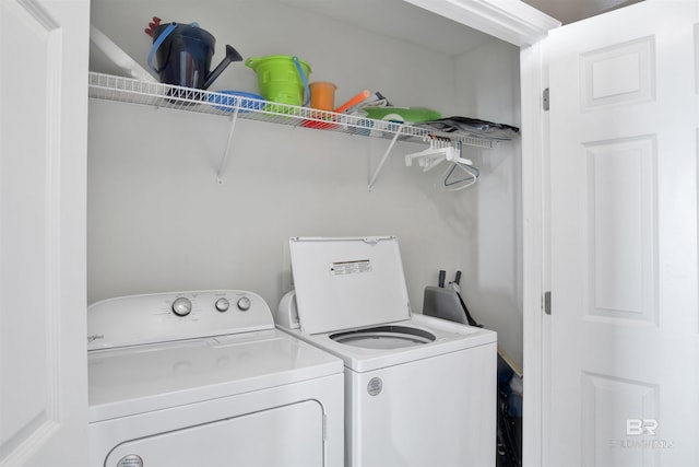 washroom with laundry area and separate washer and dryer
