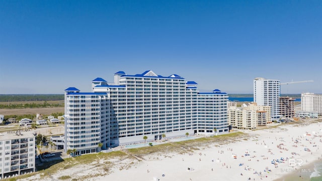 aerial view with a beach view and a water view