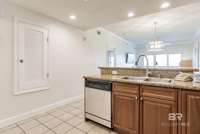 401 E Beach Blvd Unit 1302, Gulf Shores, AL 36542 - kitchen with dishwasher, a sink, crown molding, brown cabinets, and light tile patterned flooring