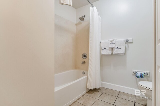 401 E Beach Blvd Unit 1302, Gulf Shores, AL 36542 - bathroom with tile patterned floors, shower / bath combination with curtain, baseboards, and toilet