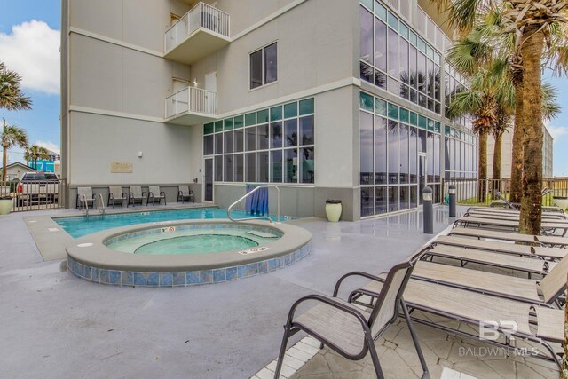 401 E Beach Blvd Unit 1302, Gulf Shores, AL 36542 - view of pool featuring a patio and a community hot tub