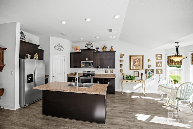 23038 Ridgewood Dr, Robertsdale, AL 36567 - kitchen featuring appliances with stainless steel finishes, a sink, lofted ceiling, light countertops, and dark wood-style floors