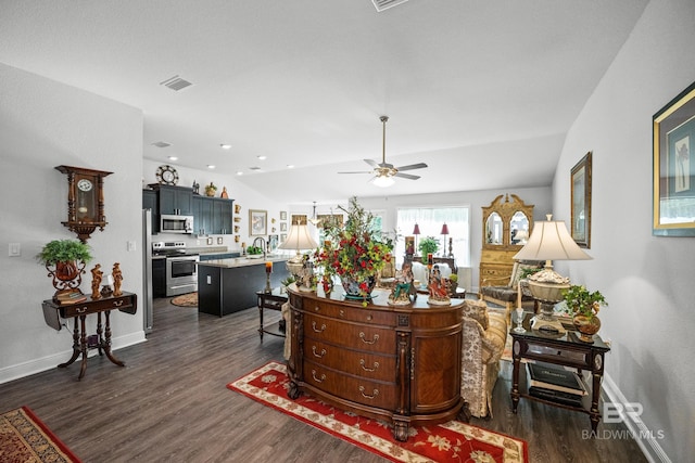 23038 Ridgewood Dr, Robertsdale, AL 36567 - living room with dark wood-type flooring, ceiling fan, and baseboards