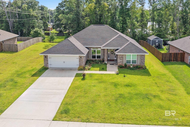23038 Ridgewood Dr, Robertsdale, AL 36567 - view of front of property with a garage, brick siding, concrete driveway, and a shingled roof