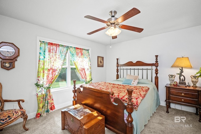 23038 Ridgewood Dr, Robertsdale, AL 36567 - carpeted bedroom with baseboards and a ceiling fan