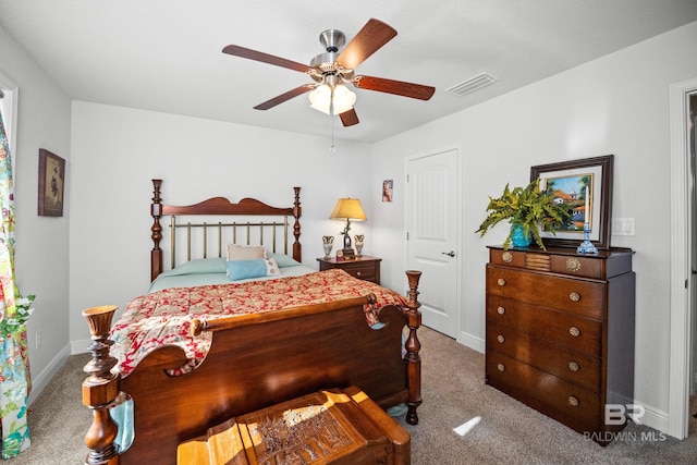 23038 Ridgewood Dr, Robertsdale, AL 36567 - carpeted bedroom with baseboards and ceiling fan