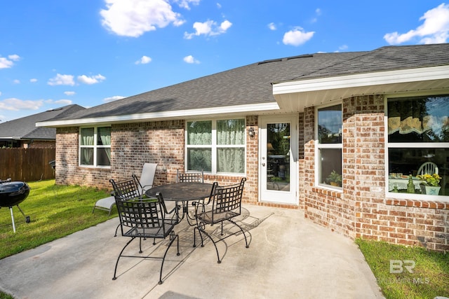 23038 Ridgewood Dr, Robertsdale, AL 36567 - view of patio / terrace featuring a grill and outdoor dining space