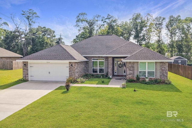 23038 Ridgewood Dr, Robertsdale, AL 36567 - view of front of house featuring brick siding, a garage, a shingled roof, and concrete driveway
