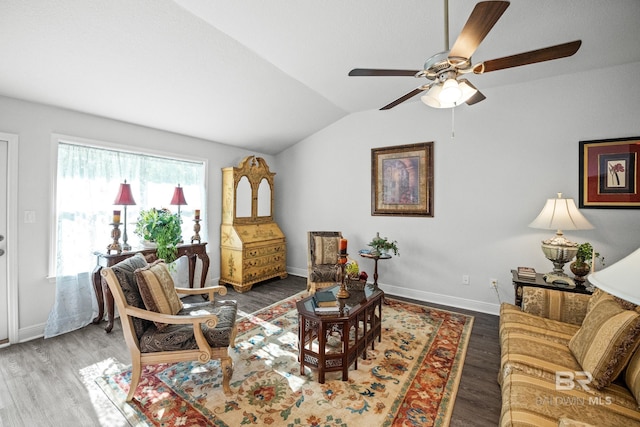 23038 Ridgewood Dr, Robertsdale, AL 36567 - living area with vaulted ceiling, ceiling fan, baseboards, and wood finished floors