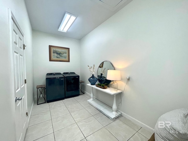 1203 Captain Oneal Dr, Daphne, AL 36526 - laundry room featuring washing machine and clothes dryer, baseboards, and light tile patterned floors