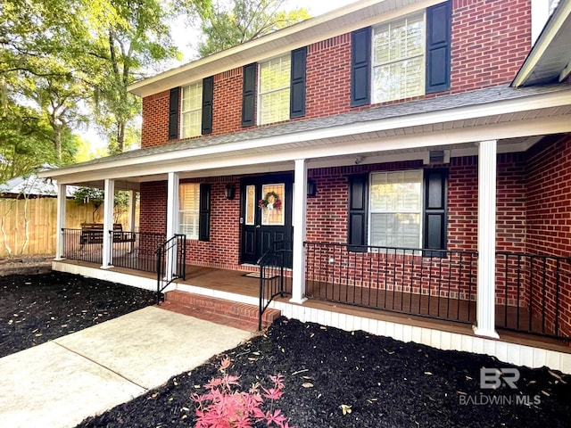 1203 Captain Oneal Dr, Daphne, AL 36526 - view of front of house featuring brick siding and a porch