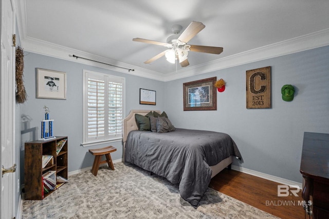 1203 Captain Oneal Dr, Daphne, AL 36526 - bedroom with ornamental molding, baseboards, wood finished floors, and a ceiling fan