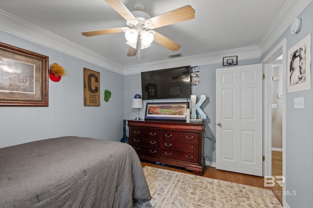 1203 Captain Oneal Dr, Daphne, AL 36526 - bedroom featuring wood finished floors, ornamental molding, and a ceiling fan
