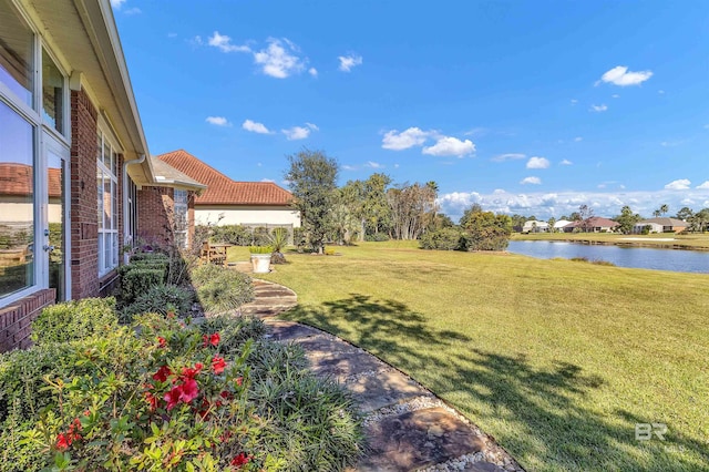 view of yard featuring a water view